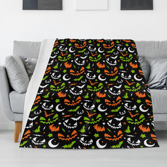 Spooky Halloween Retro Jack-O-Lantern Faces Moons Bats Black Orange Green Fleece Blanket